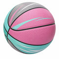 Balón de baloncesto colorido rosa, azul y gris, ideal para juegos y entrenamientos